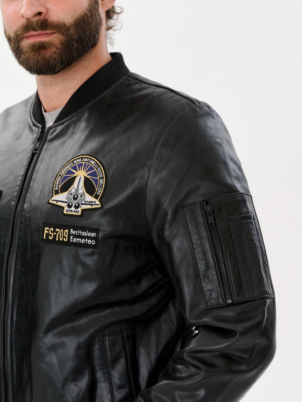Aviation bomber jacket sleeve patch and zip pocket detail – DM Legend
