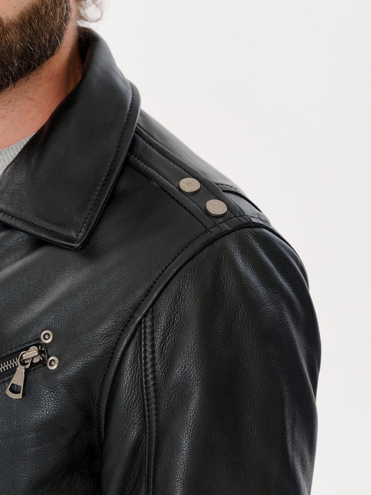 Black biker jacket shoulder and epaulette detail – DM Legend
