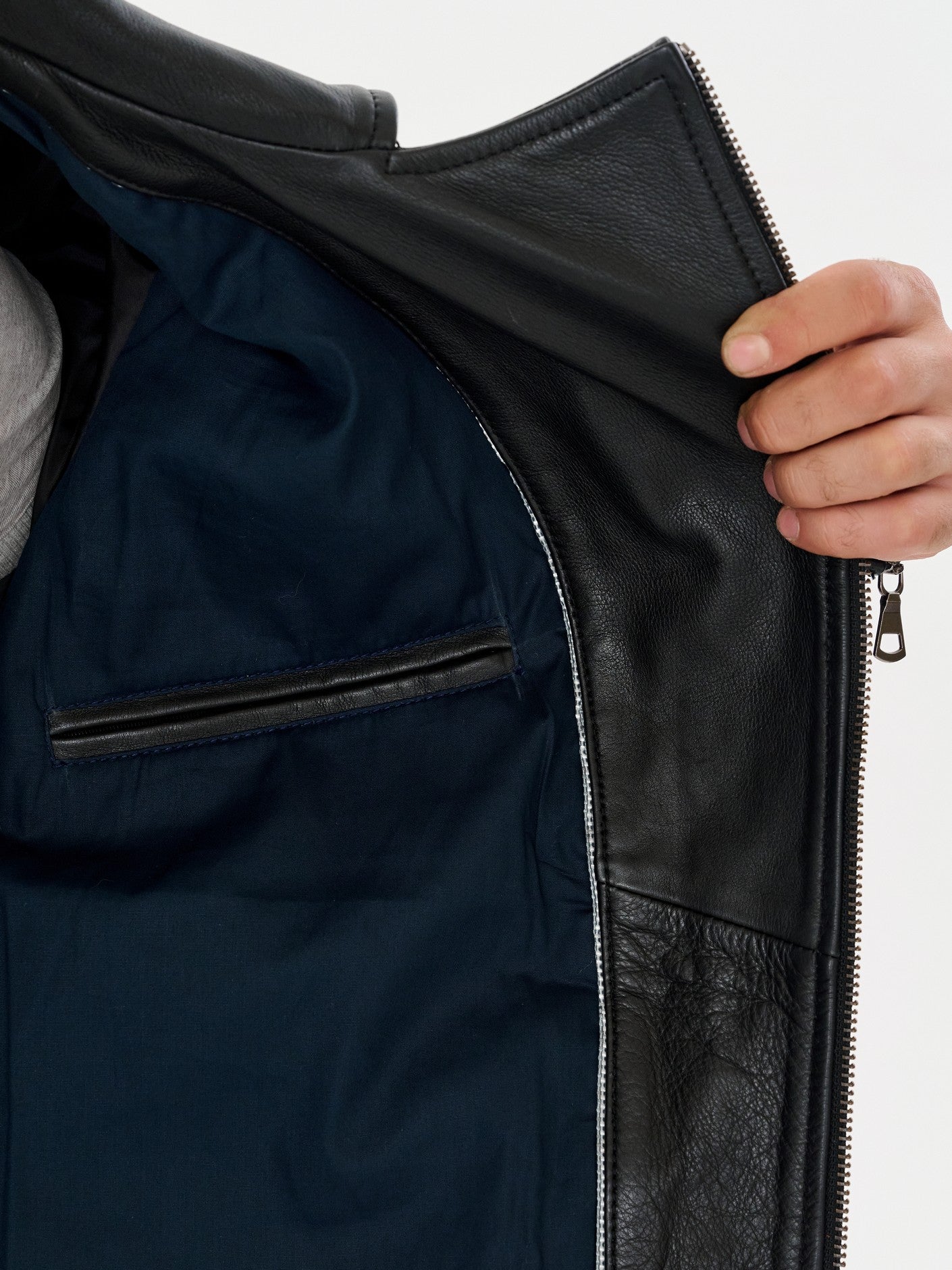 Black biker jacket inner lining and pocket detail – DM Legend