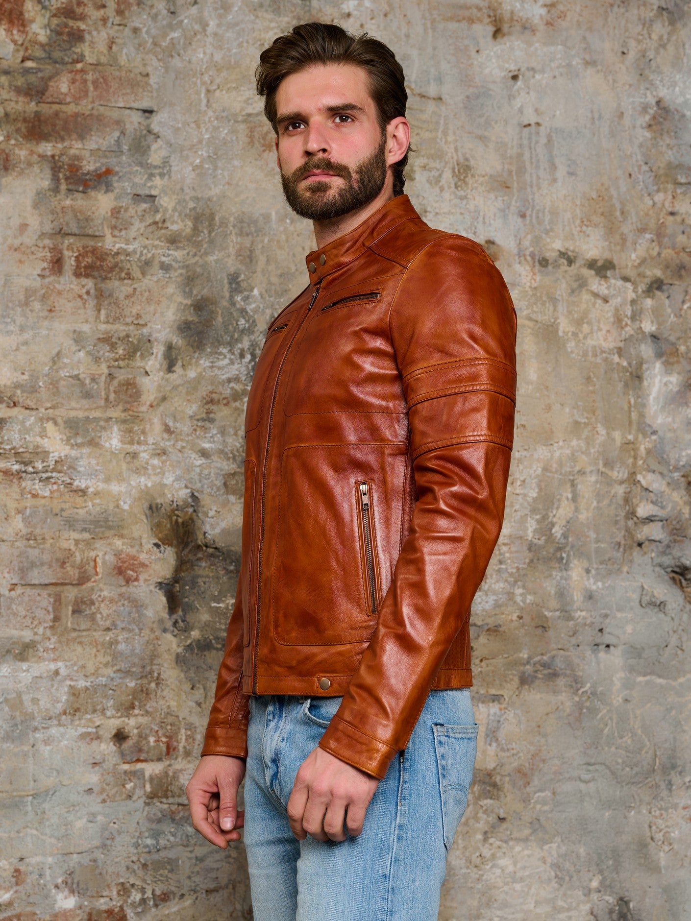 Man wearing DM Legend cognac leather jacket full length view