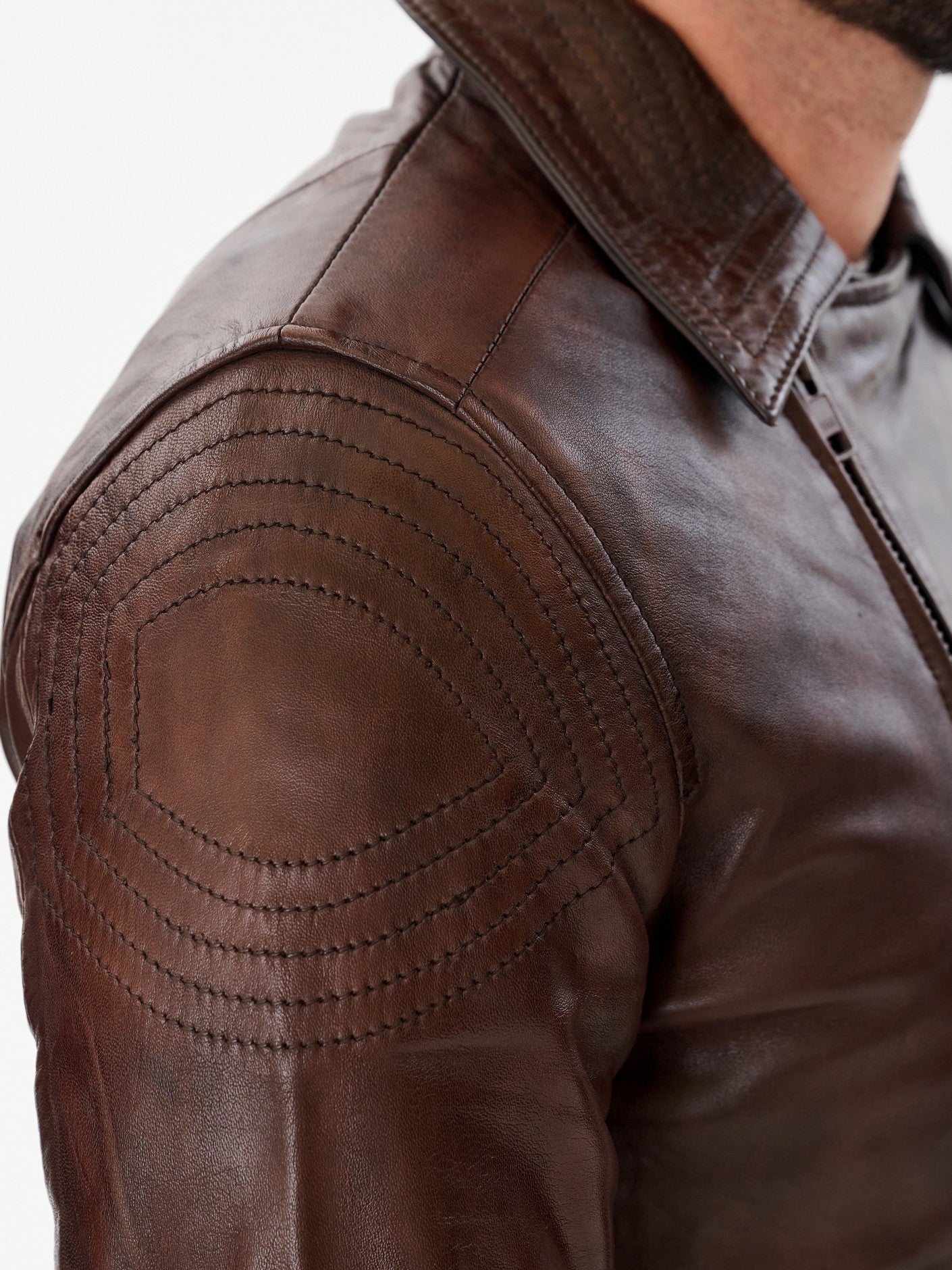 Brown biker jacket shoulder quilting detail – DM Legend