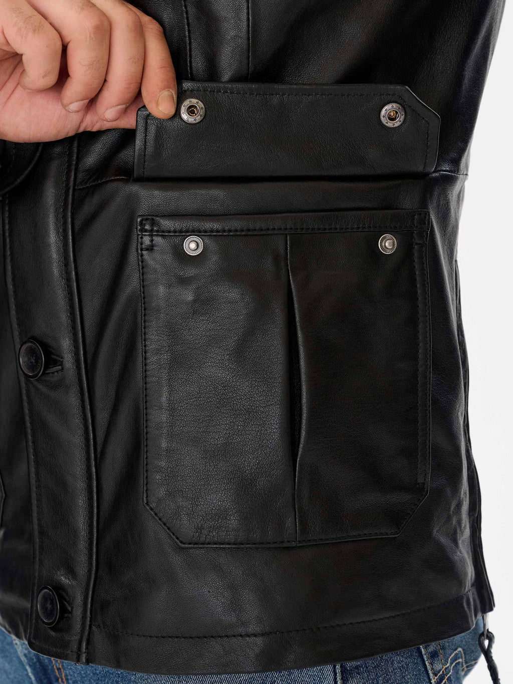 Black military jacket pocket detail – DM Legend