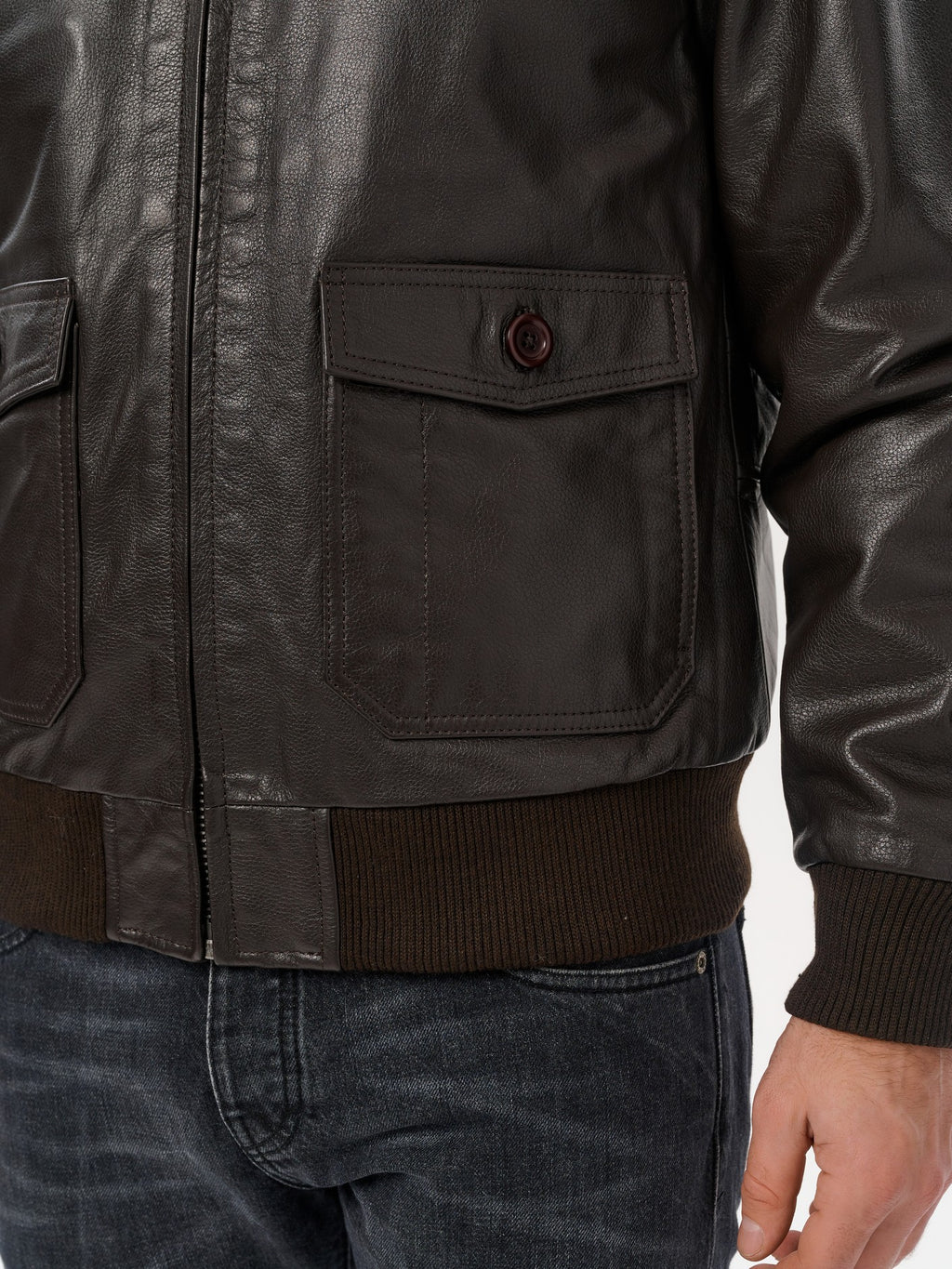 Dark brown bomber jacket patch pocket and waistband detail – DM Legend
