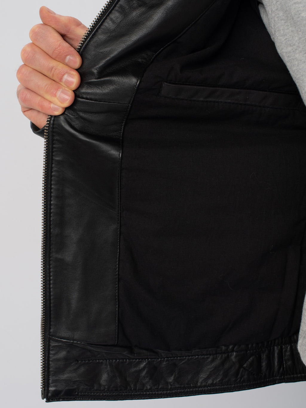 Black moto jacket inner lining detail – DM Legend