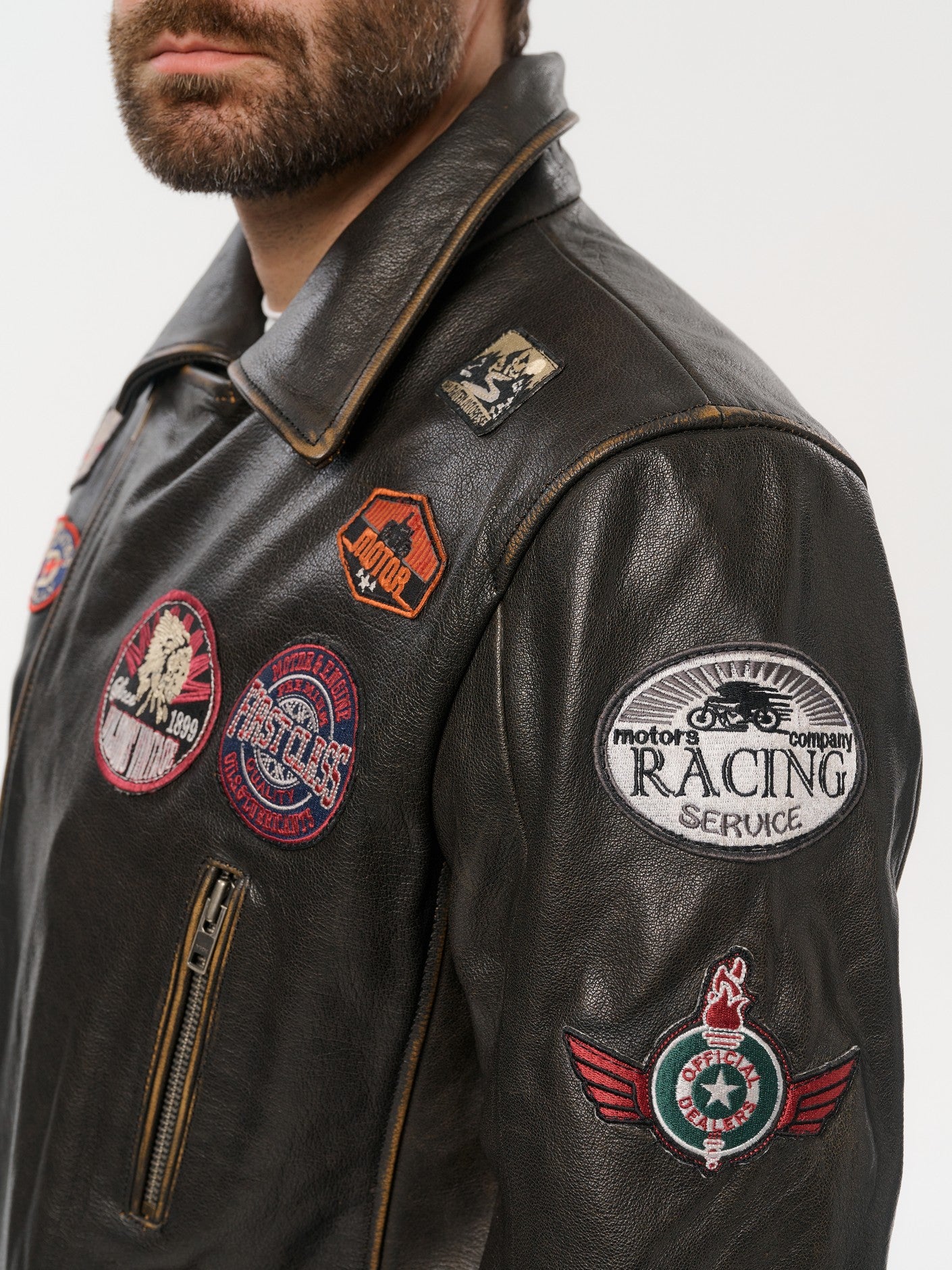 Gold brown moto jacket shoulder patch detail – DM Legend