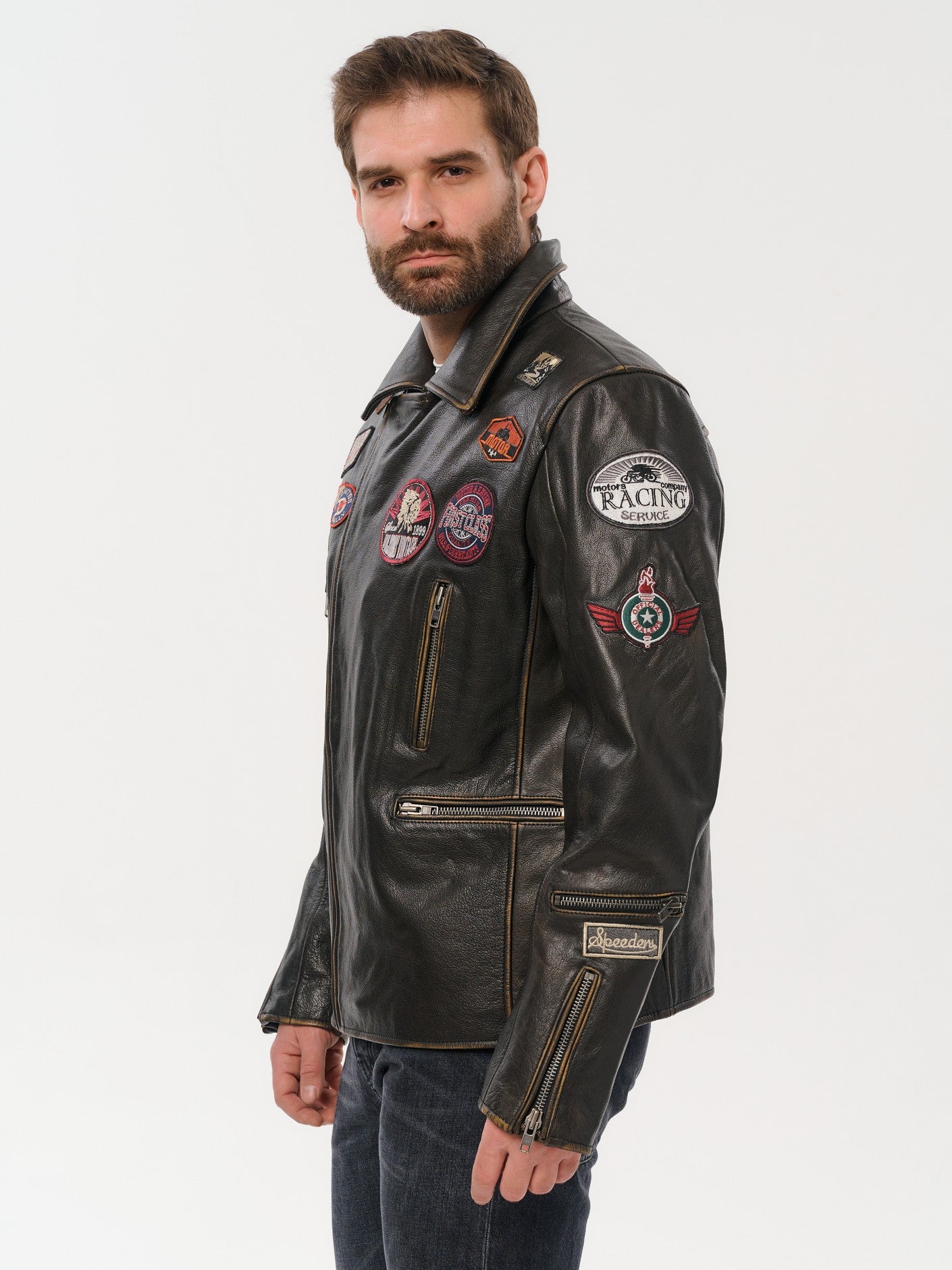 Man wearing DM Legend gold brown moto leather jacket left view